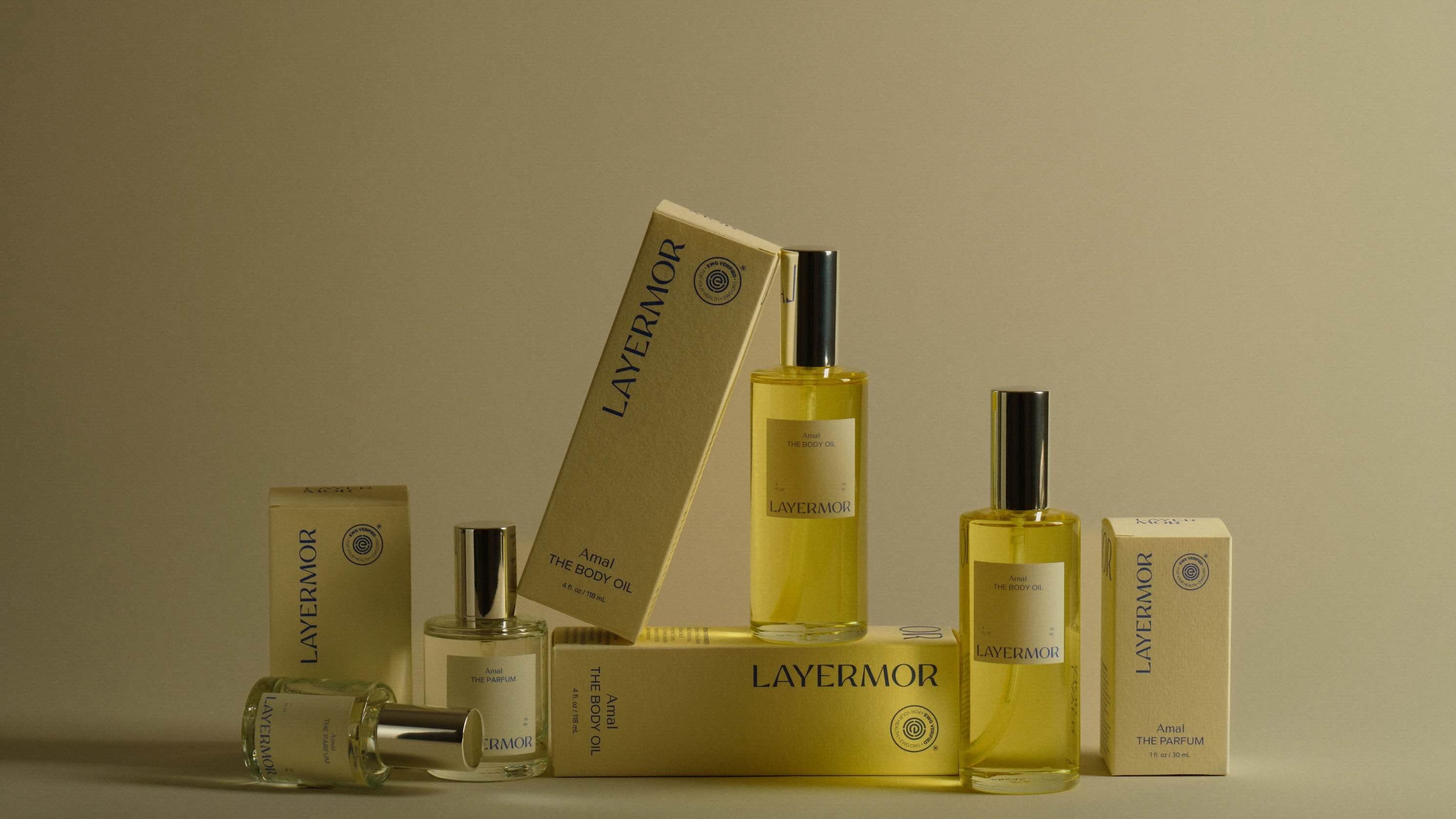 Layermor non-toxic perfume and body oil on beige background
